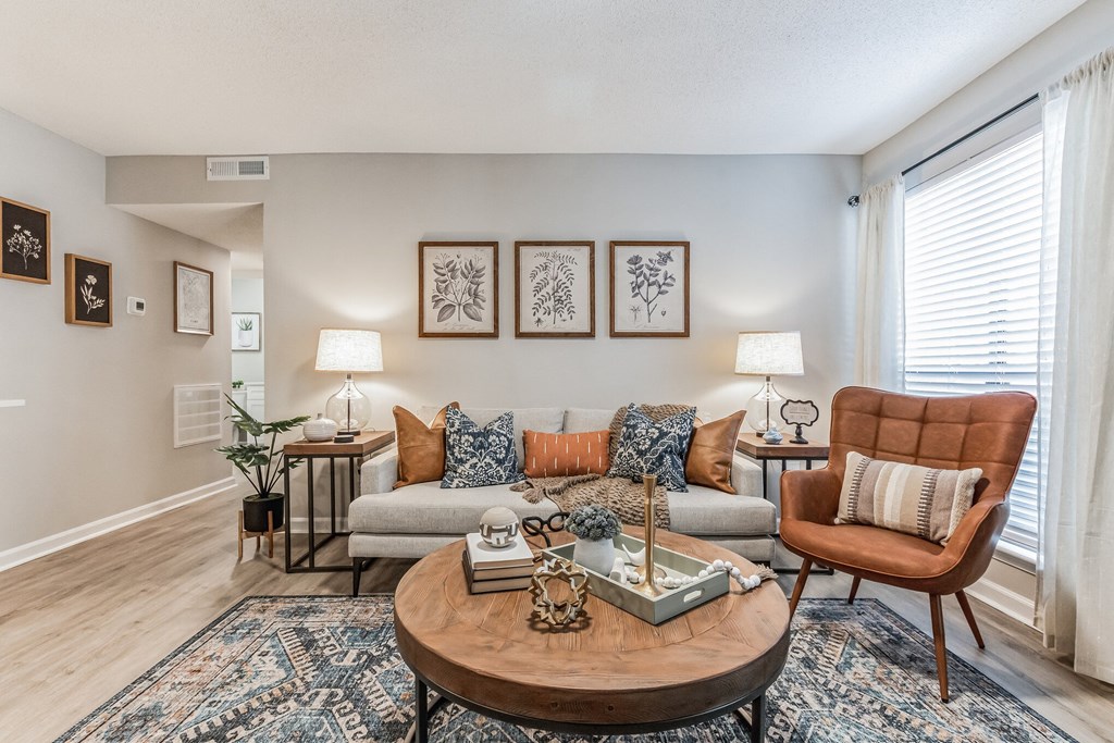 a living room with a couch chair and coffee table at Brampton Moors, Cary, NC, 27513