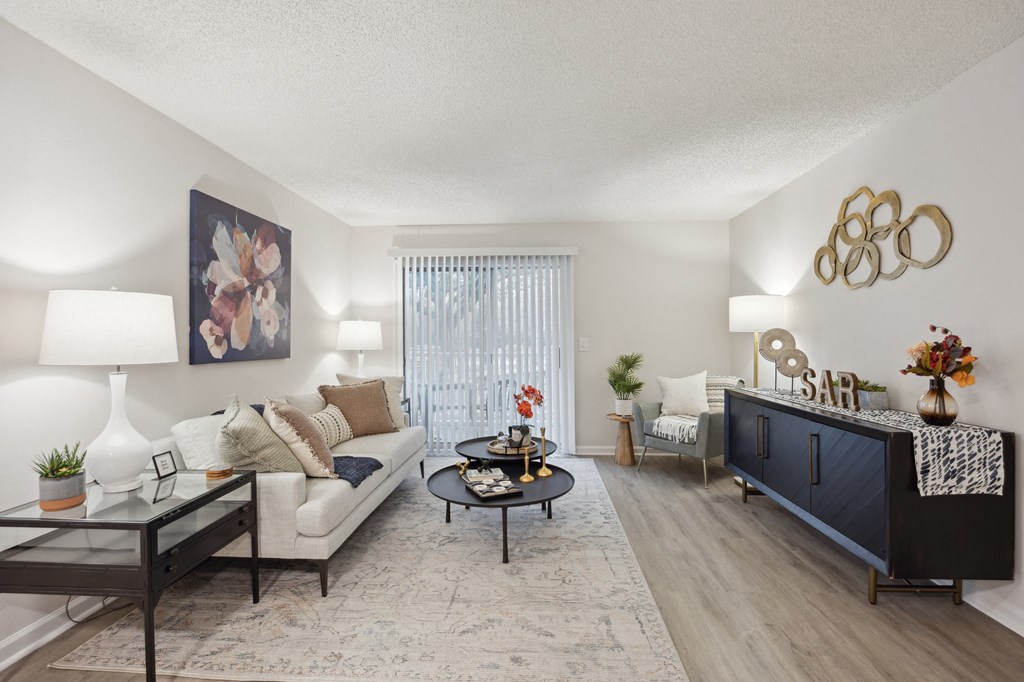 a living room with a couch and a table at St. Andrews Reserve, North Carolina, 28412