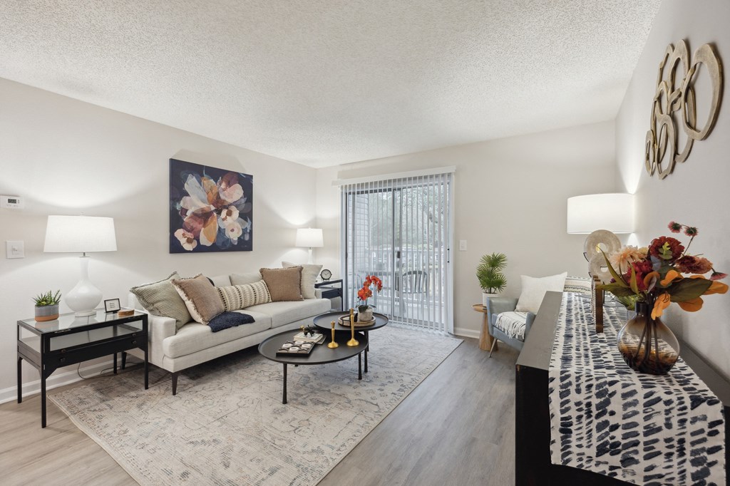 our apartments offer a living room with a couch and a table at St. Andrews Reserve, North Carolina, 28412