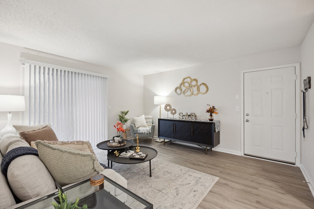 our apartments offer a living room with a couch and a tv at St. Andrews Reserve, North Carolina, 28412