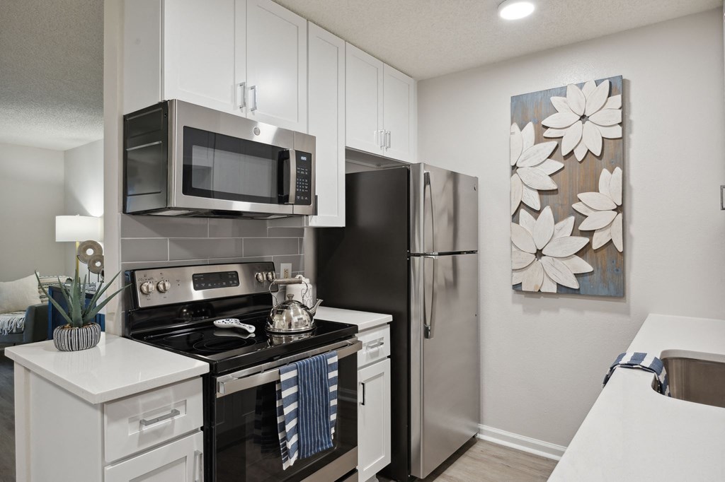 the preserve at ballantyne commons apartment kitchen with stainless steel appliances at St. Andrews Reserve, North Carolina, 28412