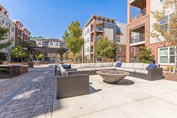 A Courtyard With Fire Pit at The Aster Apartments, North Carolina