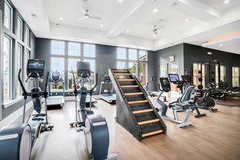 A Gym With Variety of Equipment at The Aster Apartments, North Carolina, 27519