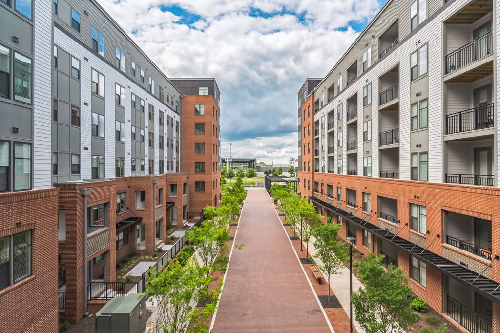 an aerial view of apartment buildings on a city street at Metropolitan at the Riverwalk, North Carolina
