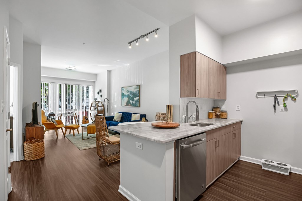 A modern kitchen with a large island and wooden floorsat Lincoln Old Town, Alexandria, VA 22314