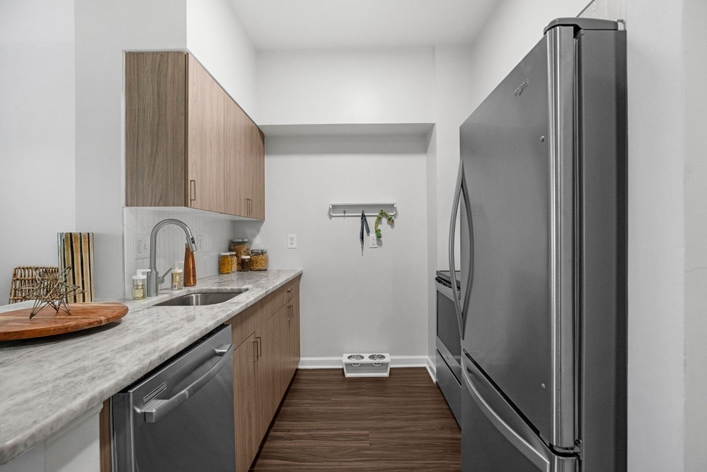 A modern kitchen with a refrigerator on the rightat Lincoln Old Town, Alexandria, VA 22314
