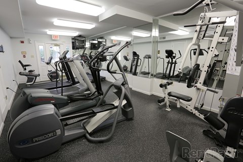 A gym with treadmills, weights, and other exercise equipment at The Fields of Rockville, Rockville, 20850