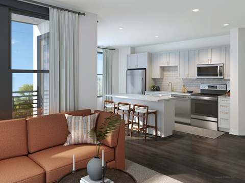 A modern kitchen with a bar stool and a sofa.