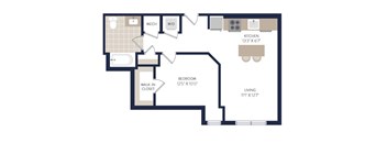 A floor plan of a living space with a kitchen, bedroom, and walk-in closet.
