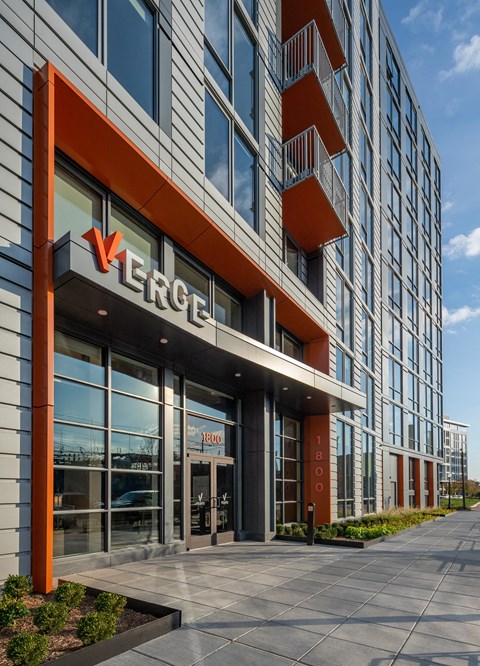 A modern building with the name Verge on the front.
