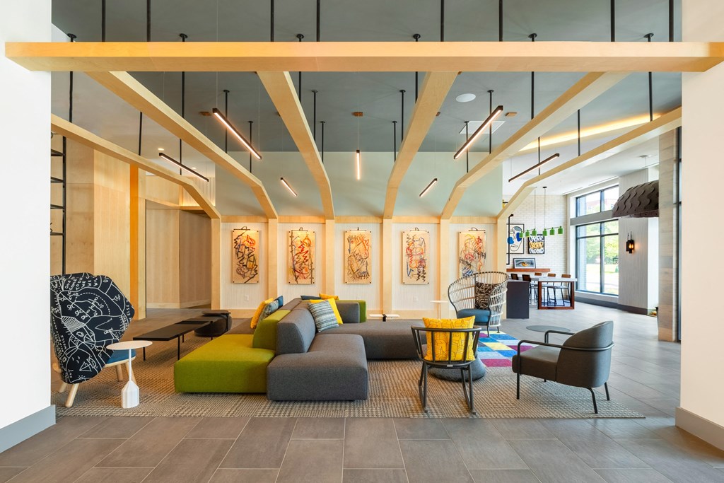 a living room with a couch and chairs at The Chase at Bryant Street, Washington, 20002