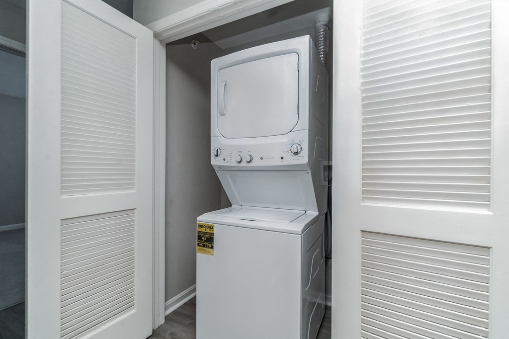 the laundry room has a washer and dryer in it at The Fields at Lorton Station, Lorton, VA