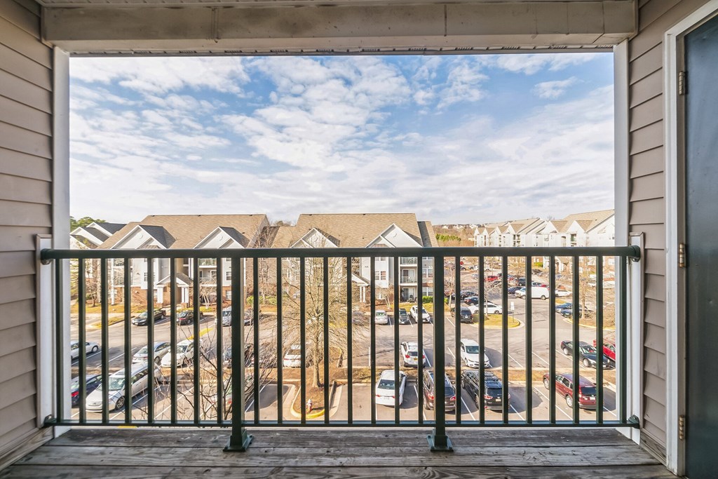 a balcony with a view of a parking lot at The Fields at Lorton Station, Virginia