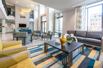 Large Clubhouse With Ample Sitting And Television Large Clubhouse With Ample Sitting And Television at Jamison at Dakota Crossing, Washington, DC - Photo Gallery 4