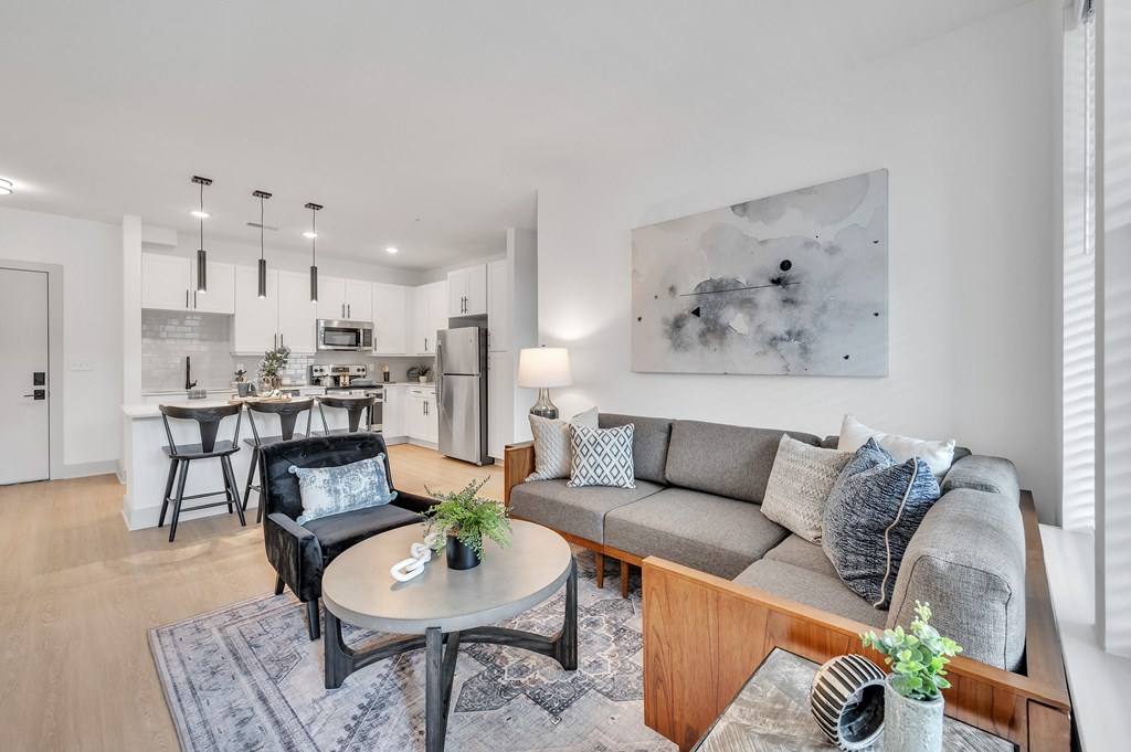 a living room with a couch and a coffee table at the Riverwalk, Wilmington, NC