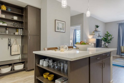a kitchen with a marble counter top