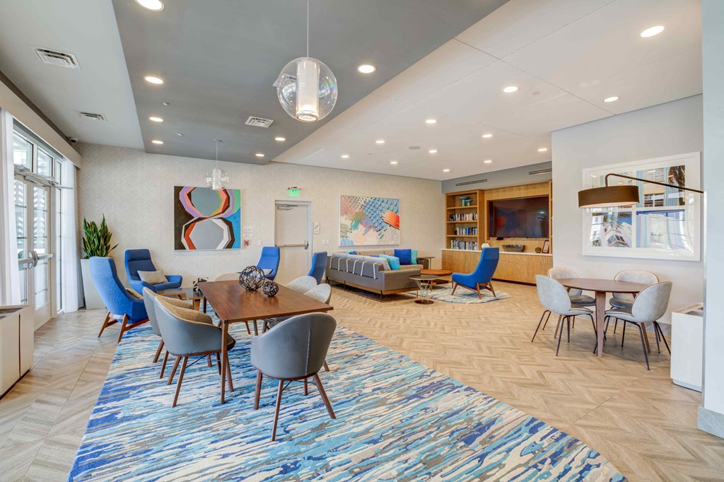 a room with a table and chairs and a couch at Celebration, Celebration, FL 34747