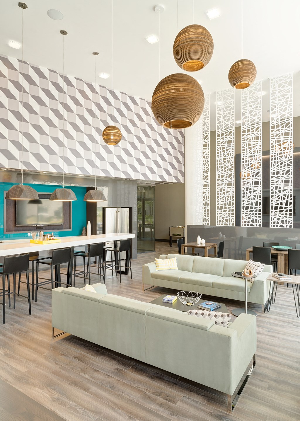 a rendering of a living room with couches and tables at Fort Totten Square, Washington