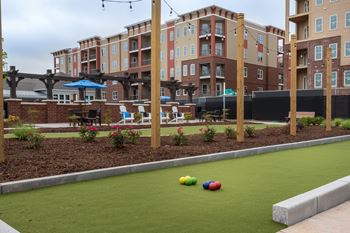 A Golf Course With Colorful Balls at The Aster Apartments, Cary, 27519