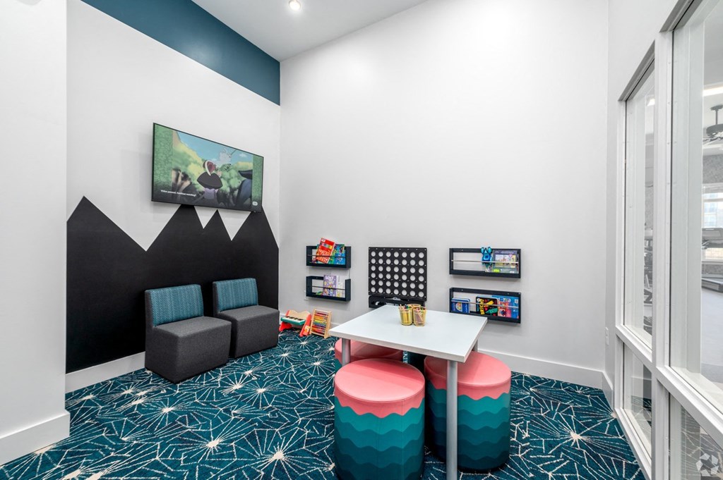 a study room with a table and chairs and a window at Fairmont at South Lake, Maryland, 20716