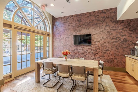 A dining room with a table set for four at Garfield Park, Arlington, 22201