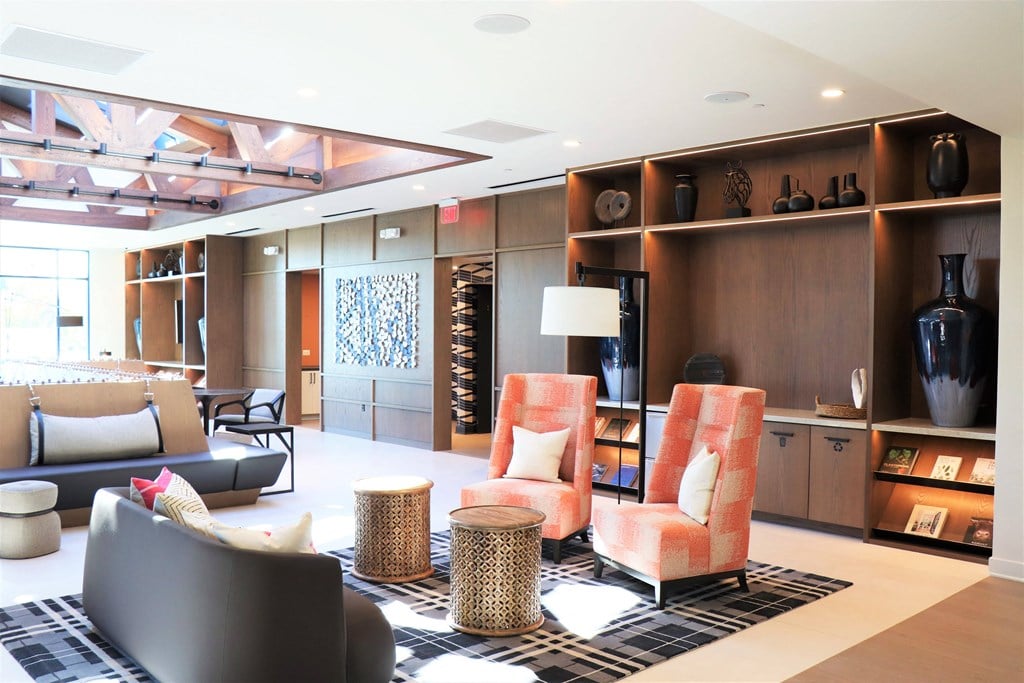 a living room filled with furniture and a large window at Vyne One Loudoun, Ashburn, Virginia