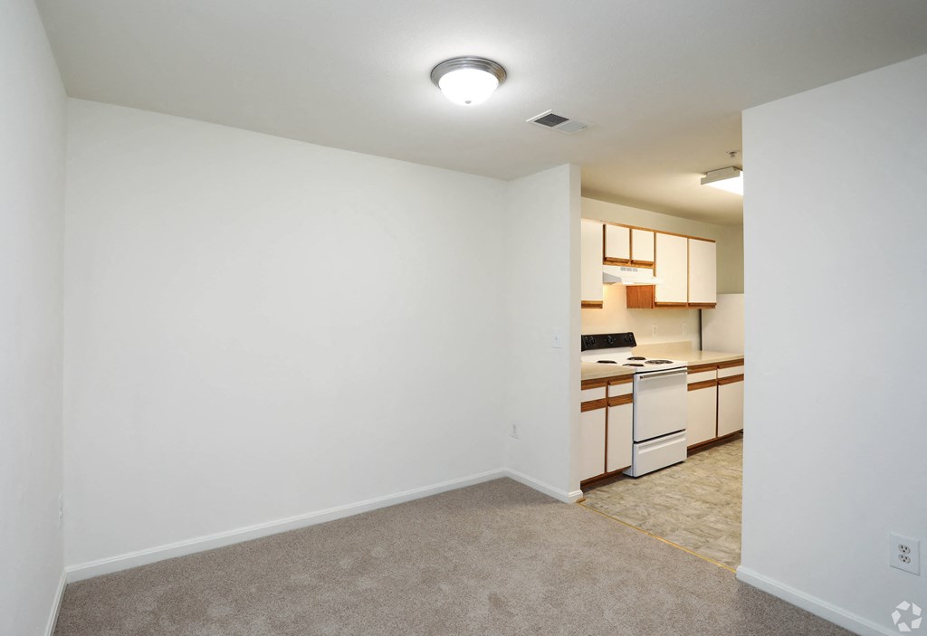 Living Room With Kitchen View at The Fields of Manassas, Manassas
