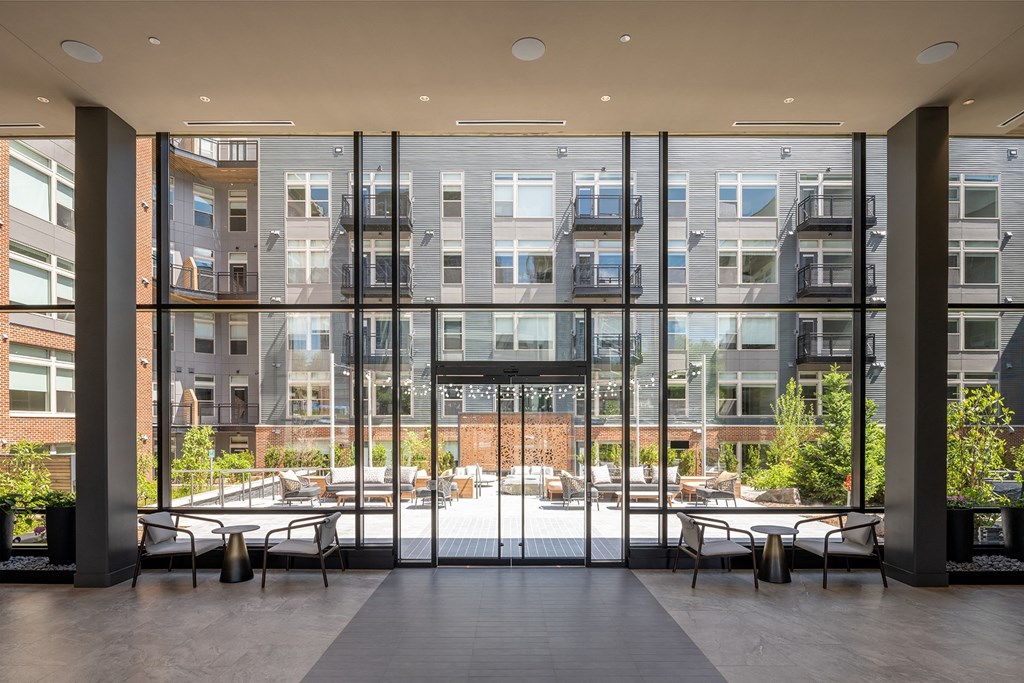 a view of the courtyard from inside the building at Brentford at The Mile, Tysons, 22102