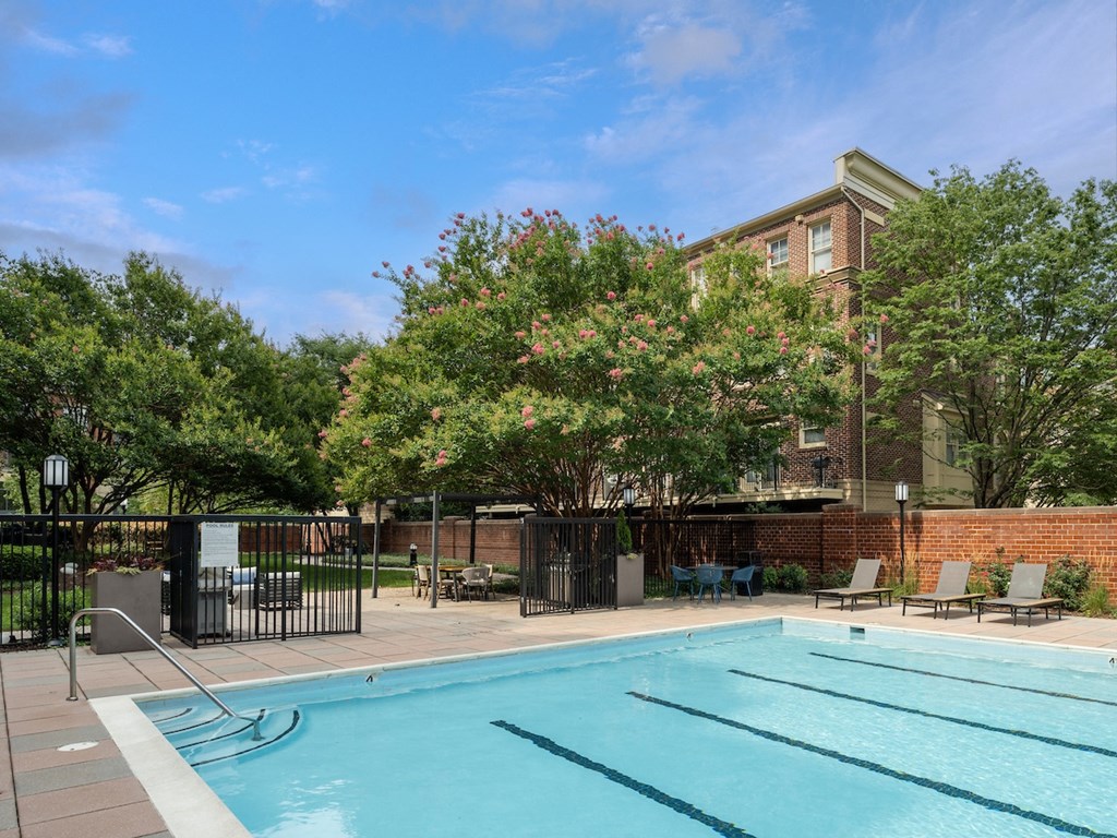 our apartments have a swimming pool and a patio with chairsat Lincoln Old Town, Alexandria, VA 22314