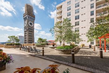 a large clock tower in the middle of a city