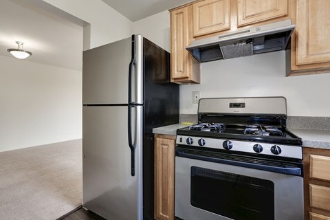 Electric Range In Kitchen at The Fields of Arlington, Arlington, VA, 22204