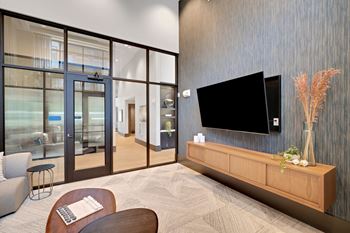 a living room with a tv on the wall at Preston Ridge, North Carolina