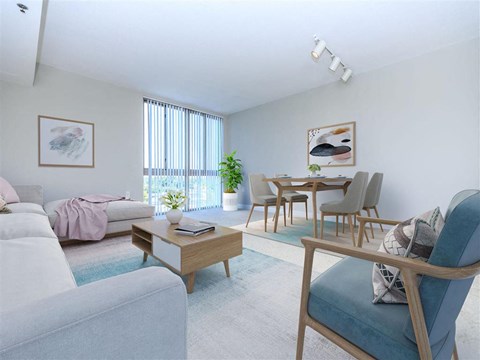 a living room and dining room with a couch and a table
