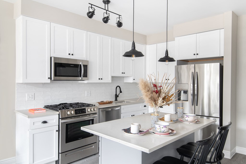 Gourmet Kitchen With Island at Park Kennedy, Washington, Washington