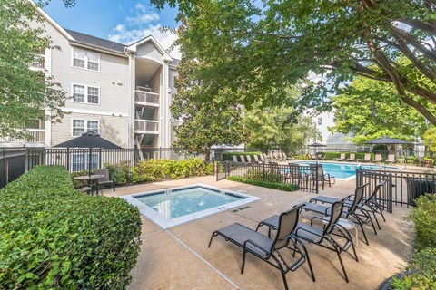 our apartments have a resort style pool and lounge chairs at Sanger Place, Lorton, Virginia