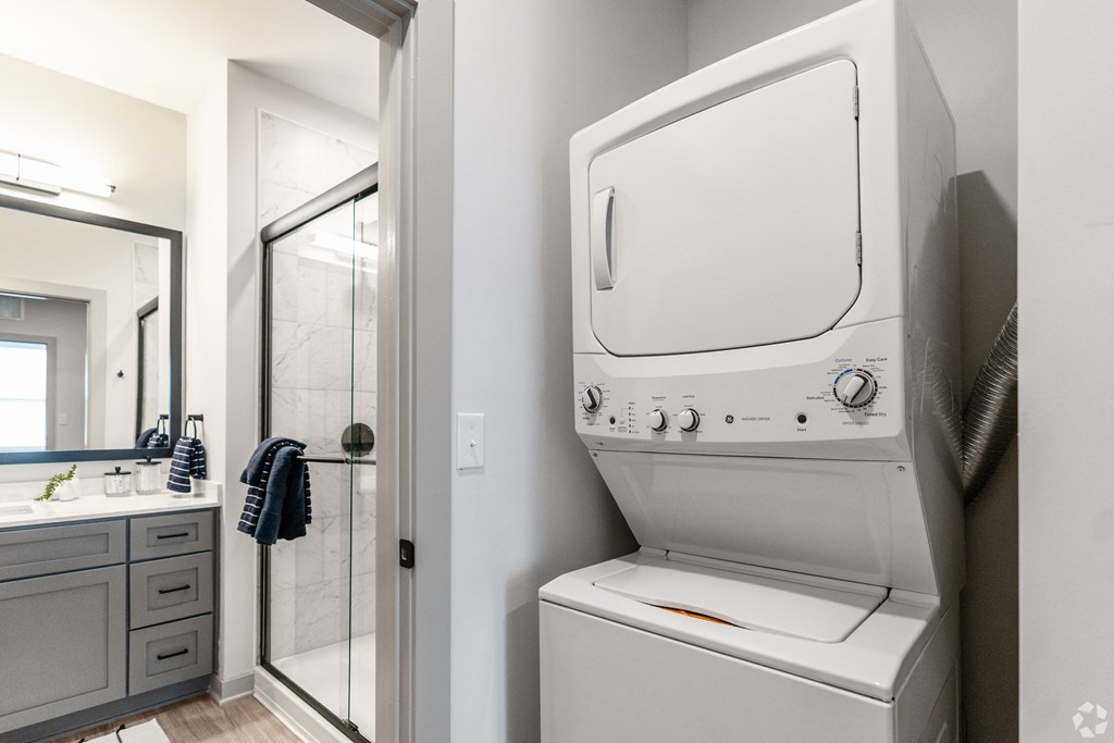a washer and dryer in apartment at Preston Ridge Cary, NC