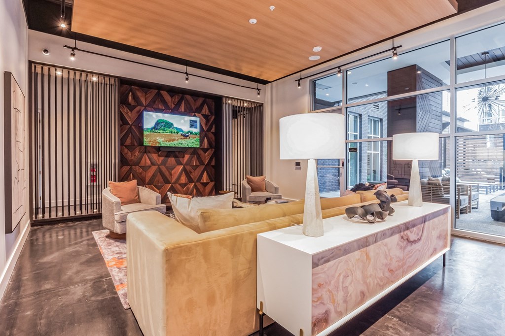 a living room with a couch and a table at South and Hollis, Charlotte, NC