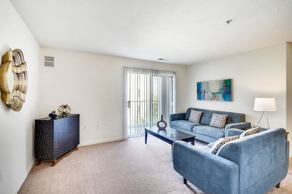 Living Room With Expansive Window at The Fields at Merrifield, Falls Church