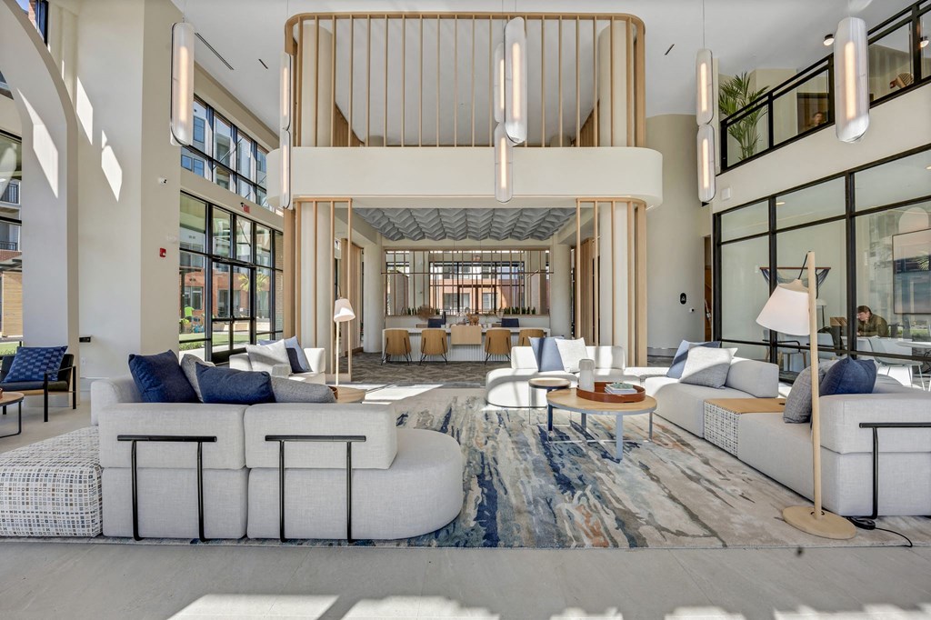 metropolitan at the riverwalk lobby with couches and chairs and a staircase at the Riverwalk, Wilmington