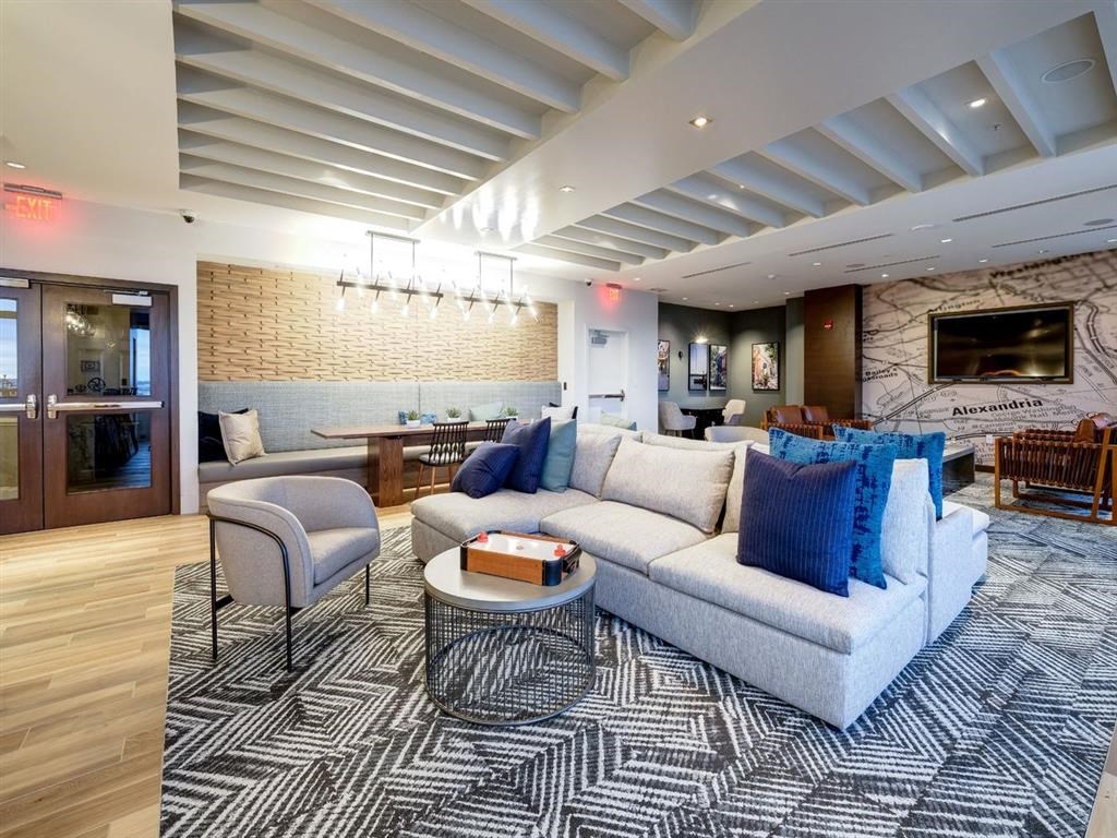 a living room with a couch and a coffee table at Lincoln Old Town, Alexandria, VA