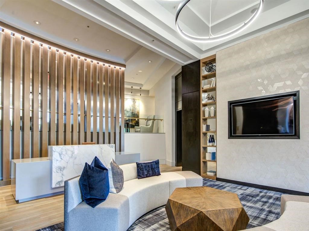 a living room with a couch and a television at Lincoln Old Town, Alexandria, VA