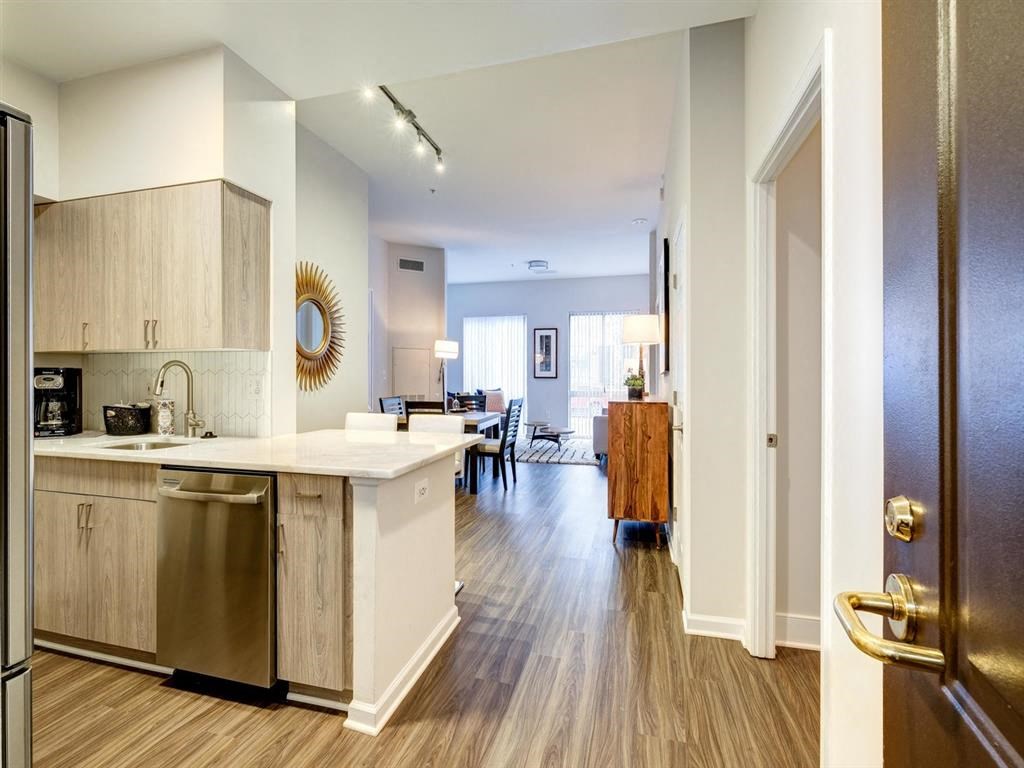 a view of a kitchen and living room from a door at Lincoln Old Town, Alexandria, VA 22314