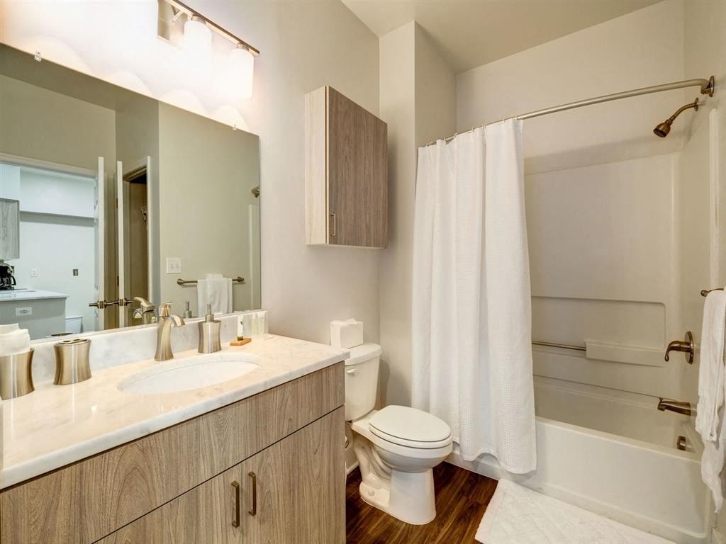 a bathroom with a shower toilet and a sink at Lincoln Old Town, Alexandria, VA 22314