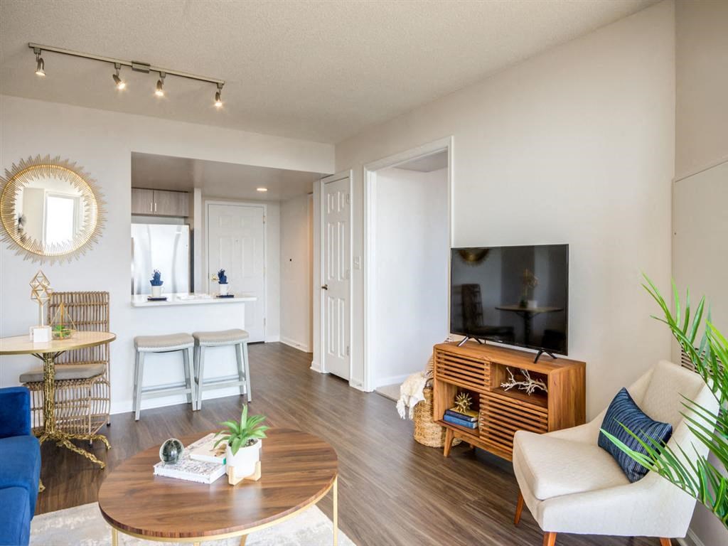 a living room with a couch and a table at Lincoln Old Town, Alexandria Virginia