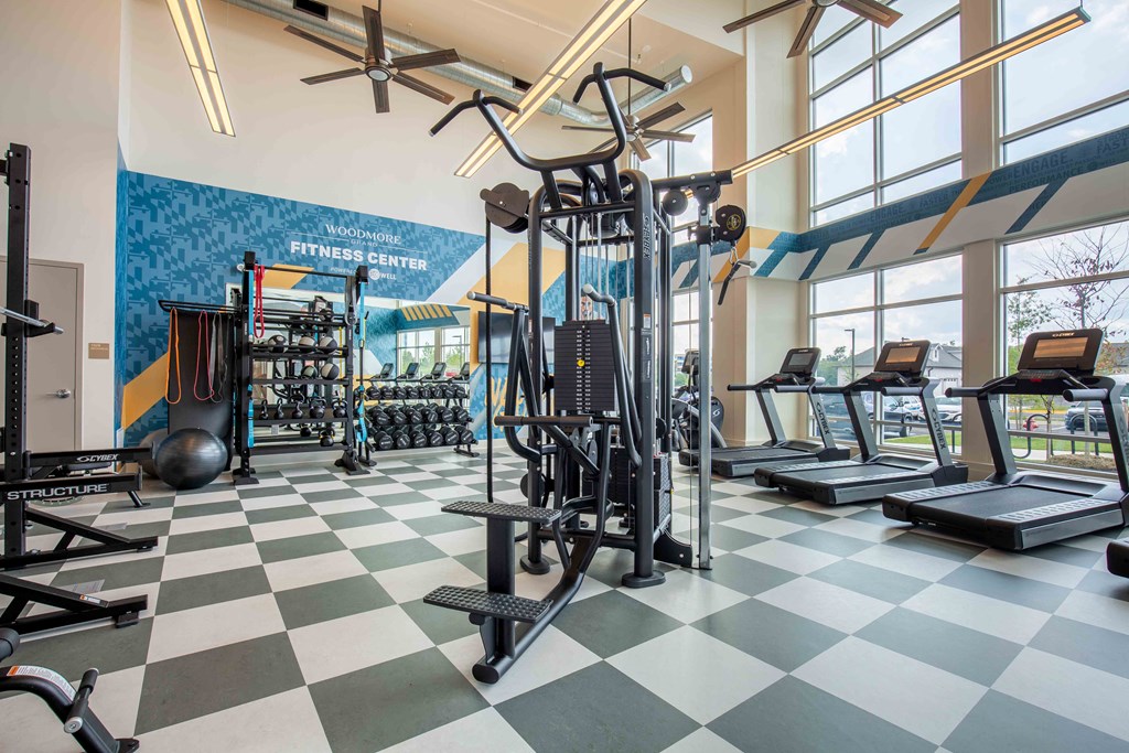 a gym with weights and cardio equipment at Woodmore Grand, Bowie, Maryland a gym with weights and cardio equipment at Woodmore Grand, Bowie, Maryland
