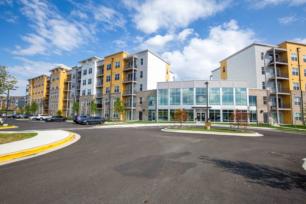 a parking lot in front of an apartment building at Woodmore Grand, Bowie, 20721