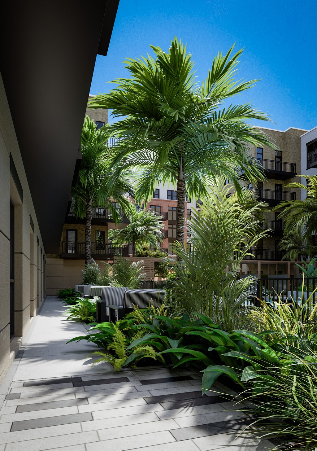 the courtyard is lined with palm trees and other plants