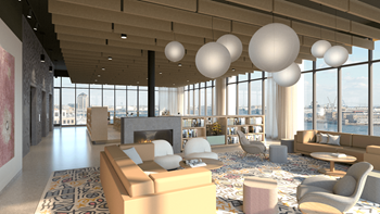 Living room with large windows and a fireplace at Allied Harbor Point, Baltimore