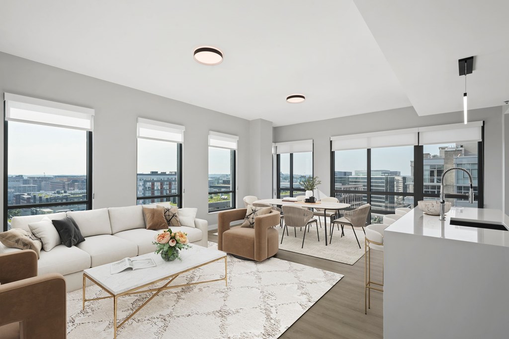 A modern living room with a view of the city.