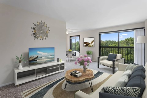 Living room with balcony and modern furnishings at Remington Place Apartments, Fort Washington